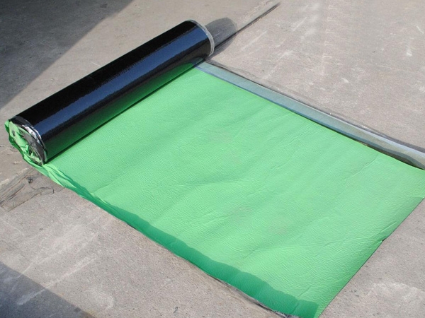 Self adhesive wet laid waterproof membrane